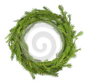Traditional wreath of fresh spruce branches Isolated on a white background. For christmas design. Christmas holiday.