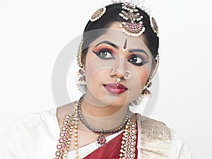 Traditionally attired asian bride photo