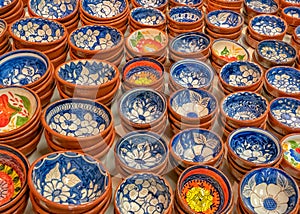 Traditionally decorated Portuguese terracotta dishes, Portugal.. photo