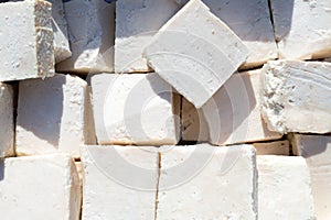 Traditionally manufactured soap win white cubes photo