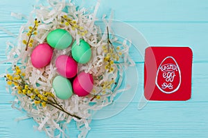 Traditionally painted Easter eggs in nest.