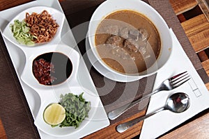 Tradtional food from Makassar named coto photo