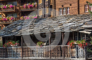 Tradtional wooden houses and roofs, Zermatt, Switzerland photo