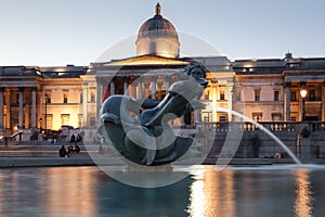 Trafalgar Square and the National Gallery in London illuminated at night