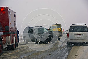 Traffic accident, on icy road photo