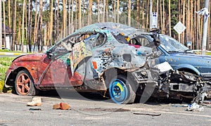 Traffic accident on the street, damaged car after a collision in the city. Accident due to speeding and alcohol intoxication.