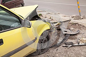 Traffic accident. Yellow crashed car