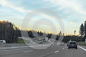 Traffic on the autobahn during sunset