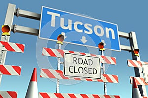 Traffic barricades near Tucson city traffic sign. Lockdown in the United States conceptual 3D rendering