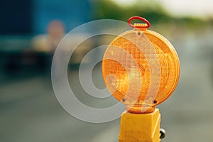 Traffic beacon warning light during road maintenance photo