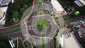 Traffic of cars on a roundabout at night
