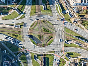 Traffic circle with tramways, trams and cars in Krakow, Poland. Aerial view