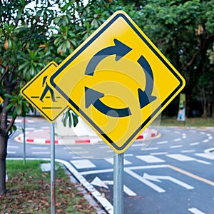 Traffic circle yellow sign