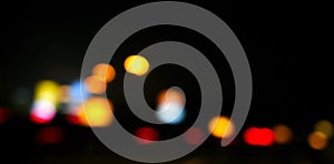 traffic in the city night Circular colorful bokeh light, abstract blur defocused background.