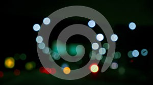 traffic in the city night Circular colorful bokeh light, abstract blur defocused background.