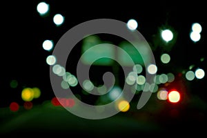 traffic in the city night Circular colorful bokeh light, abstract blur defocused background.