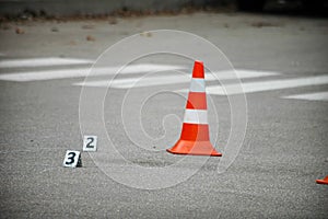 Road traffic cone on acident site