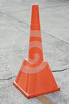 Traffic cone on the cement road, in school