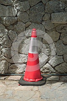Traffic cone on sidewalk