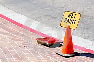 Traffic cone and wet paint