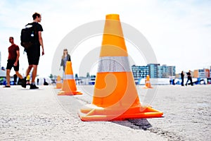 Traffic cones on a city street. Improvements to public space infrastructure and road surfaces