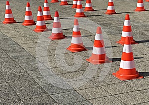 Traffic cones on the paving stone area