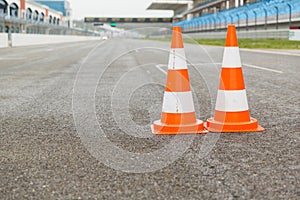 Traffic cones on speedway of stadium