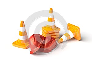 Traffic cones with work helmet on the white.