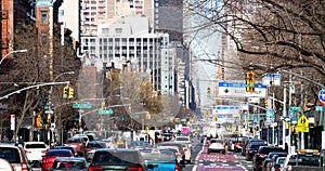 Traffic congestion from cars backed up along First Avenue through the East Village of New York City at rush hour photo