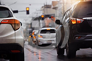 Traffic congestion in dusk during hard rain fall in the city