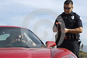 Traffic Cop By Sports Car photo