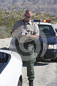 Traffic Cop Writing Ticket