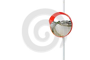 The traffic curve mirror, convex mirror on the road for safety isolated on white background with clipping path.