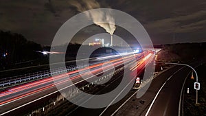 Traffic on freeway A2 near Hannover in Germany at winter night. Timelapse.