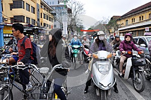 Traffic in Hanoi. Crowd of motorbike drivers on the street