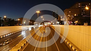 Traffic on the highway of big city (at night), Moscow, Russia