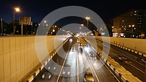 Traffic on the highway of big city (at night), Moscow, Russia