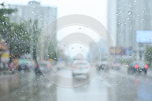 traffic on highway with cars on rainy day, blur background