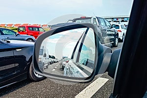 Traffic jam in a car mirror