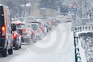 Traffic jam in the middle of winter. Snow calamity.