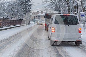 Traffic jam in the middle of winter. Snow calamity.