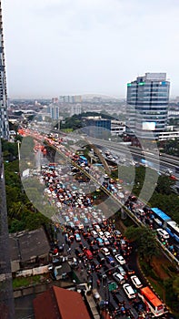 Traffic jam at the red light at Tugu Pancoran, South Jakarta
