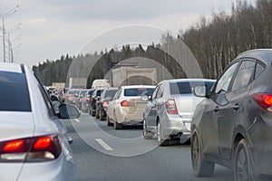 A traffic jam with rows of cars. Shallow depth of field. Background