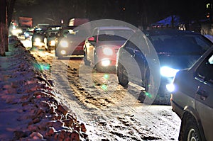 Traffic jam on the snow-covered road