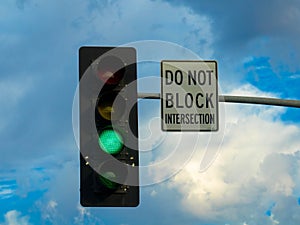 Traffic light, do not block intersection. Seen at Los Angeles Highway, United States.