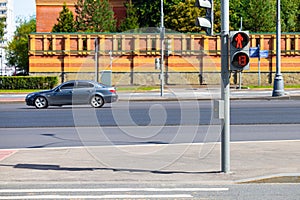 traffic light on an empty crosswalk in the city