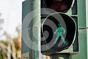 Traffic light with the green man sympol. photo