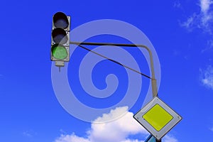 Traffic Light Over Blue Sky Background.