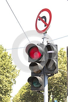 Traffic light and prohibited turn sign