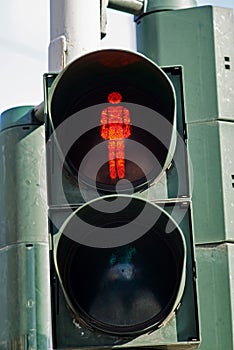 Traffic light with the red man sympol. photo